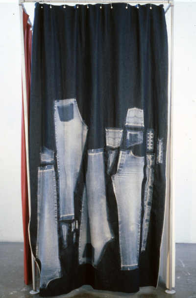 "Changing Room"  clothing items, fabric, metal poles.  7ft x 3ft x3ft
1990s.  I took apart my jeans, t-shirt, bra, underwear, and stitched them back into similar fabric.